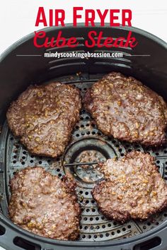 hamburger patties cooking in an air fryer with text overlay that reads, air fryer recipe steak