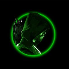 a man with a hoodie and bow in front of a green circle on a black background