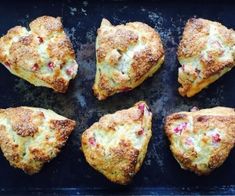 six pieces of pizza sitting on top of a pan