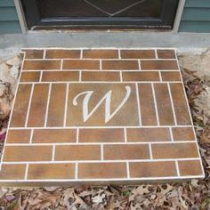 a door mat that has the letter w on it