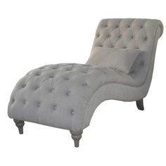 a gray chaise lounge chair with buttons on it