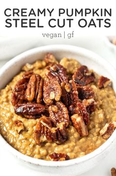 creamy pumpkin steel cut oats with pecans in a white bowl