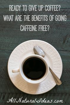 a cup of coffee sitting on top of a white saucer