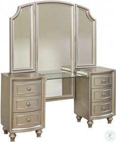 a mirrored desk with two drawers and a mirror on it's side, next to an armoire