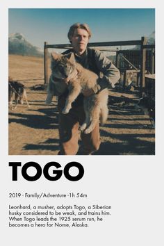 a man holding two cats in front of him and the caption says togo