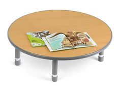 a wooden table with magazines on it