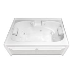 a white bath tub sitting on top of a counter