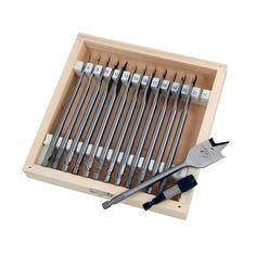 a set of tools in a wooden box