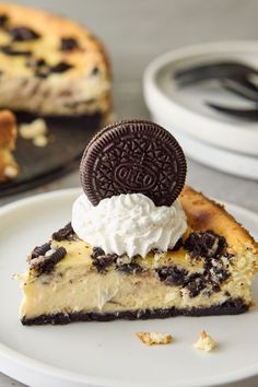 a slice of cheesecake with oreo cookies on top