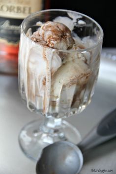 an ice cream sundae in a glass on a table