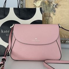 This Is Guaranteed 100% Authentic Kate Spade Bag Purchased At A Store In The Us With The Tag Attached. Buy With Confidence! Measurements 10.16" W X 7.2" H X 3.6" D Features Strap Drop: 22" Foil Embossed Logo Closure Type: Flap With Magnetic Snap Closure Dust Bag Included: No Interior: Back Zip And Front Slip Pockets Materials Pebbled Leather Lining: Two Way Script Logo Lining Imported Style Number Kc465 Tea Rose Color, Logo Line, Tea Rose, Script Logo, Tea Roses, 6 D, Rose Color, Embossed Logo, Kate Spade Bag