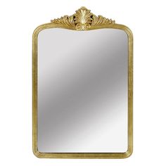 a gold framed mirror on a white background