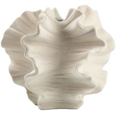 a white vase that is shaped like a shell on a white background, with the bottom section slightly open