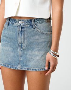 This denim skirt features a low rise waist, contrast stitching detail and mini length. Blue Viper, International Clothing, Denim Mini, Denim Mini Skirt, Swimwear Accessories, Jeans Dress, Denim Skirt, Low Rise, Mini Skirt