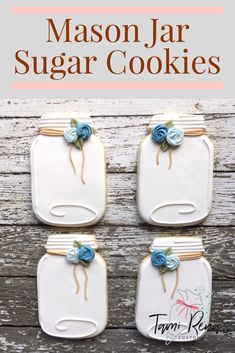 mason jar sugar cookies with blue flowers on top and the words mason jar sugar cookies