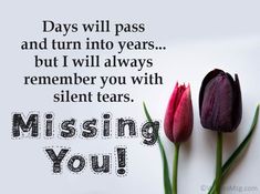 two tulips sitting next to each other on top of a white surface with the words missing you