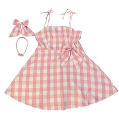 a pink and white checkered dress with matching headband, necklace and hair clip