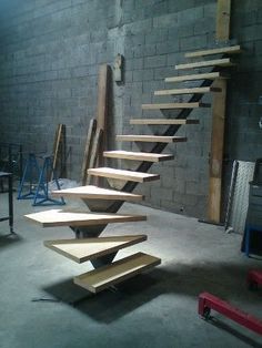 a staircase made out of wooden planks in a building