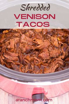 shredded venison tacos in a slow cooker with text overlay that reads shredded venison tacos