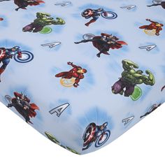 the avengers baby crib sheet is blue with cartoon characters on it