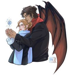 a man and woman hugging each other in front of a dragon's wing wings