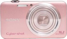 a pink digital camera sitting on top of a white surface