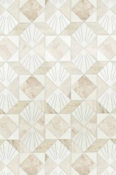 a white and beige wallpaper with geometric shapes