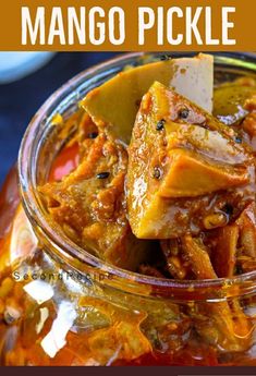 a glass jar filled with mango pickle