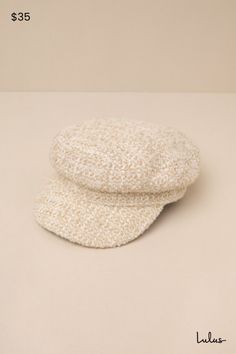 a white hat sitting on top of a table