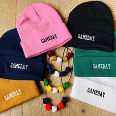 "Gear up for game day with our Game Day Beanie Set, designed to elevate your team spirit to new heights. This set includes a custom color beanie in your choice of team colors, along with a matching necklace set that completes your game-day ensemble (contact me for customs for your favorite team Features a unisex beanie in 6 available styles, as well as a coordinating necklace set made from 15-20mm wooden geometric beads, and set on a 24\" waxed cotton cord. Includes extender." College Tailgate, Cheer Coach Gifts, College Tailgating, Cheer Coach, Cheer Coaches, Coach Gift, Coach Gifts, Skull Cap Beanie, Matching Necklaces