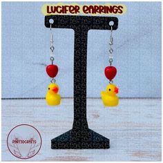 Duck earrings inspired on Habin Hotel's Lucifer Morningstar 🍎 Hazbin Hotel Earrings, Has Been Hotel, Hotel Artwork, Duck Earrings, Funny Pix, Lucifer Morningstar, Little Duck, Birthday List, Morning Star