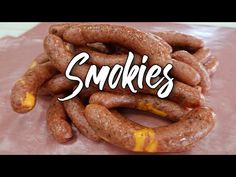 a pile of sausages with the word smokies in front of them