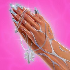 a woman's hand with long nails and bracelets on her fingers, against a pink background