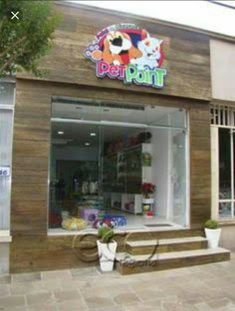 the pet shop is located on the side of the building