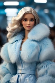 a barbie doll wearing a blue dress and fur coat