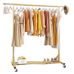 a rack with clothes and shoes hanging on it's sides next to a basket