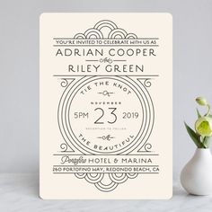 an art deco inspired wedding save the date card in black and white, with flowers