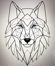 a black and white drawing of a wolf's head