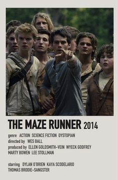 the maze runner movie poster with many young men pointing at something in front of them