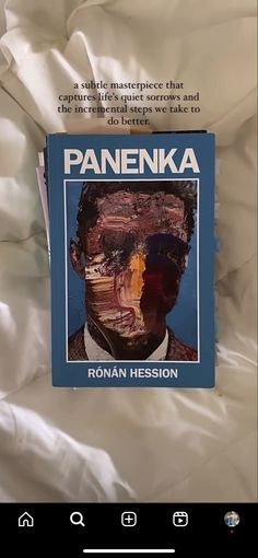 the book panenka by roman hestion is sitting on top of a bed