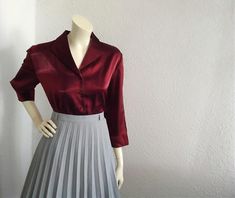 90s GERRY WEBER burgundy blouse iridescent blouse evening party blouse disco shirt elegant shiny blouse wing collar minimal dark red blouse 38 Eu size, US 8 size  75% viscose and 25% polyester  measurements lying flat : shoulders :40 cm (15.5 inches)  bust :50cm (19,5 inches)  waist :45 cm (17,5 inches)  total length :60 cm (23,5inches)  sleeve length :47 cm (18.5 inches) Fitted Red Shirt For Party, Fall Party Burgundy Blouse, Chic Short Sleeve Party Shirt, Classic Fall Party Blouse, Elegant Burgundy Tops For Evening, Collared Summer Party Blouse, Fitted Collared Party Top, Summer Party Collared Blouse, Collared Summer Blouse For Parties