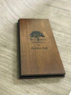 a wooden book sitting on top of a table