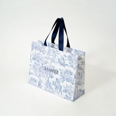 a blue and white toiler bag with the name samoe on it's front