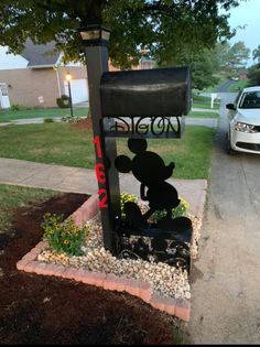 a mailbox with a mickey mouse on it