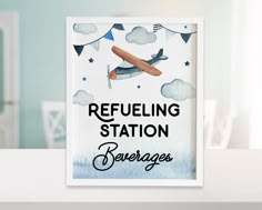 there is a sign that says refueling station beverages on the table in front of it