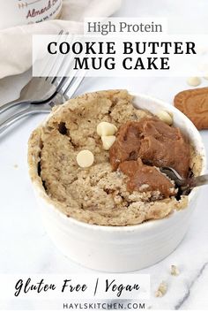 a close up of a bowl of cookie butter mug cake