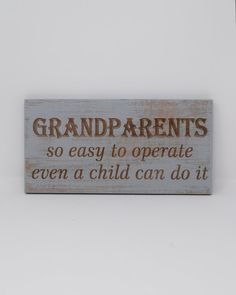 a wooden sign that says grandparents so easy to operate even a child can do it