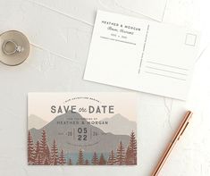 save the date postcard with mountains and trees