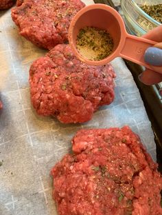 the hamburger patties are ready to be cooked and put in the oven with seasoning