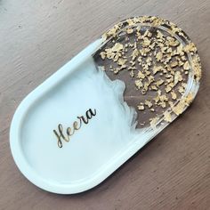 there is a plate with food on it that says fera in gold letters,